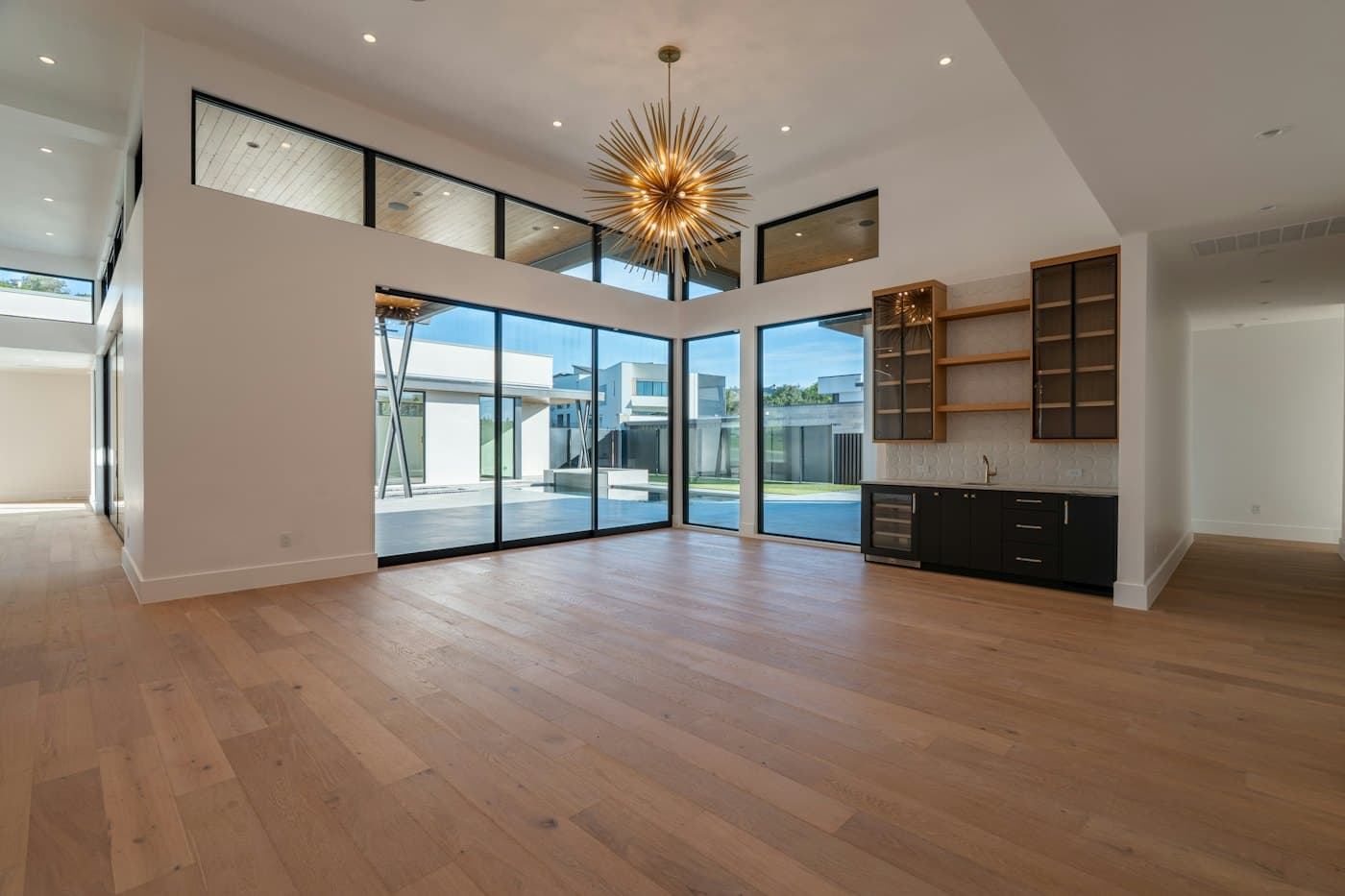 Open room finished with light timber-look flooring